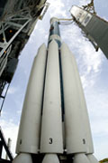 Bottom-up view of the solid rocket motors stacked around the booster stage